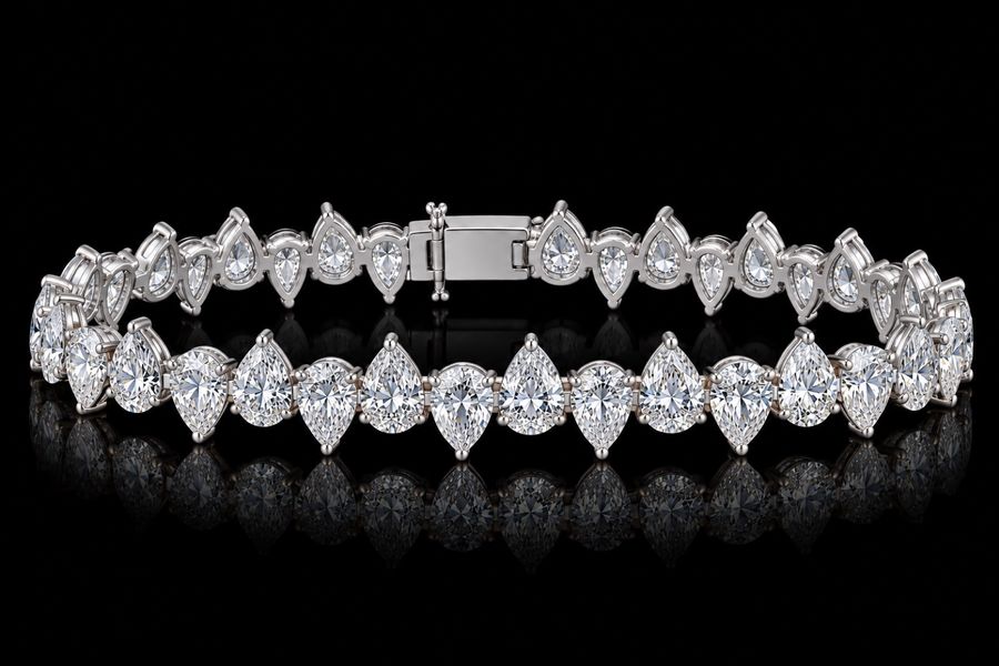 Alternating Pear Diamond Bracelet in 14KT White Gold, laid flat