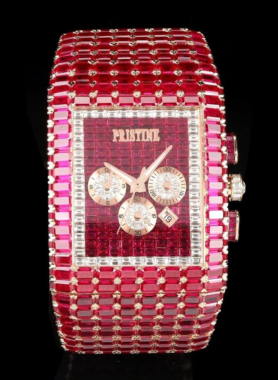 Pristine rectangular watch set with red baguette stones, three subdials